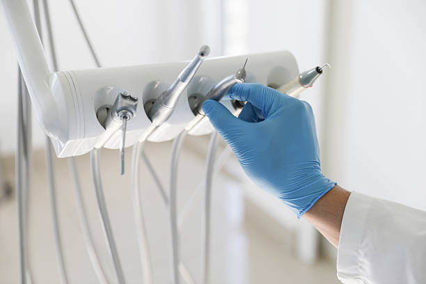 Professional Tooth Extraction technician working in Guthrie, OK